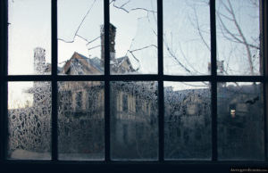 View of Halcyon Hall from a barred window