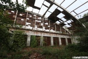 Airplane hangar with a roof in disrepair