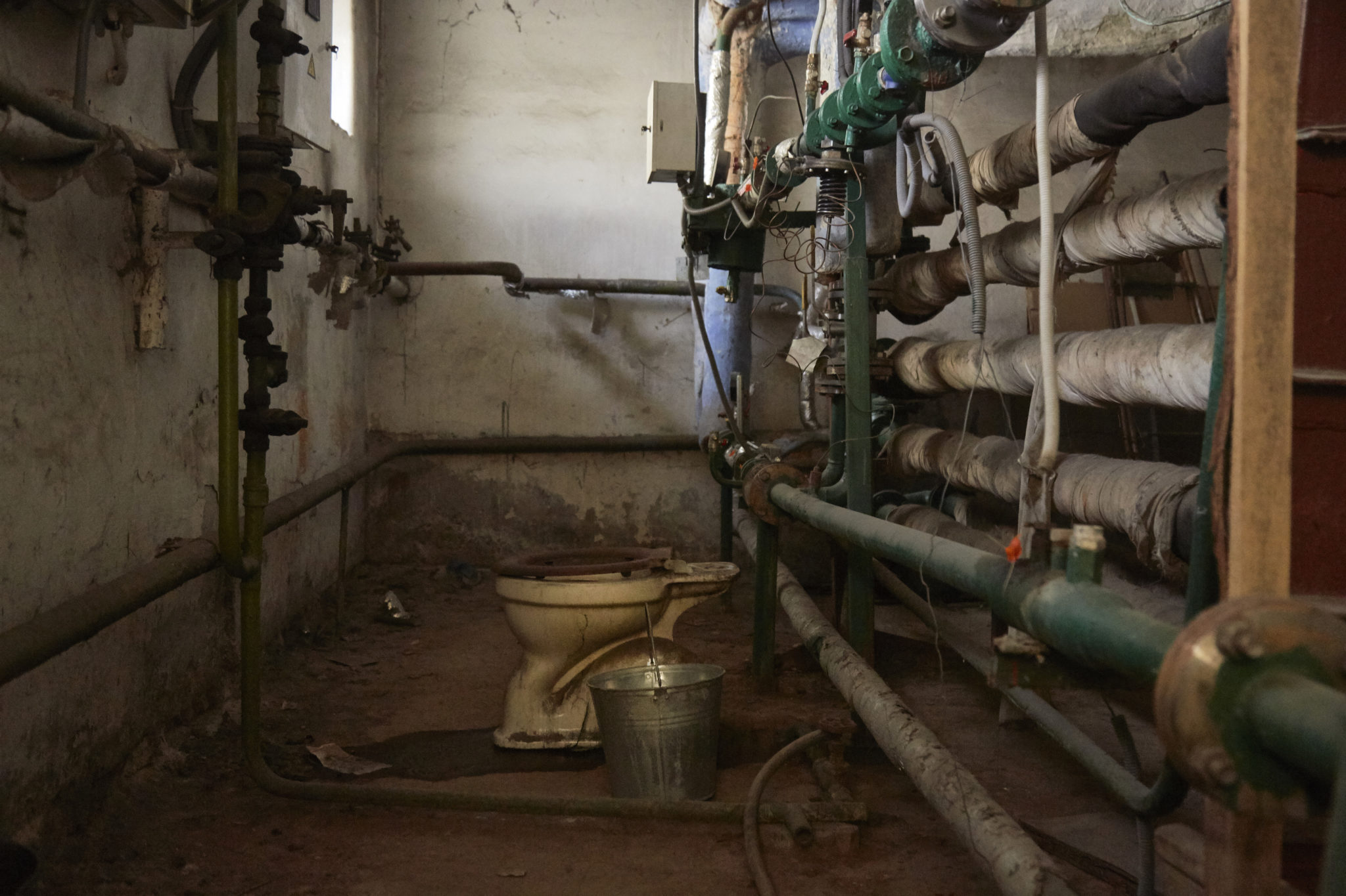 why-lone-toilets-sit-in-the-middle-of-pittsburgh-basements-abandoned