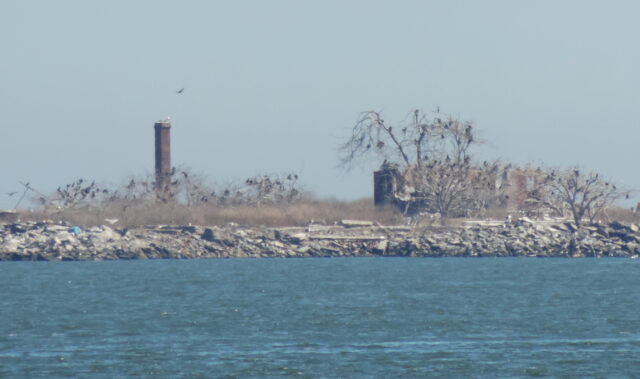 An island with an abandoned chimney column. 