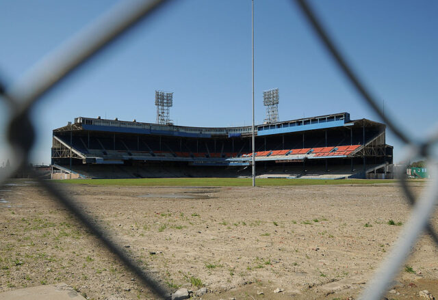 View of Tiger Stadium through a chainlink fence