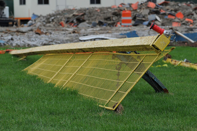 Portion of a foul pole in the grass