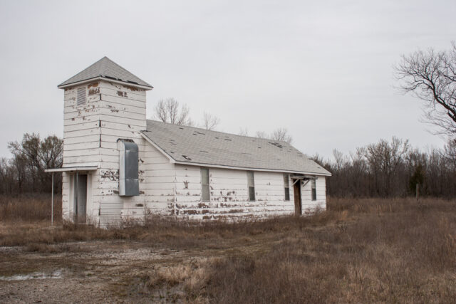 An abandoned home in a field in Picher, Oklahoma.