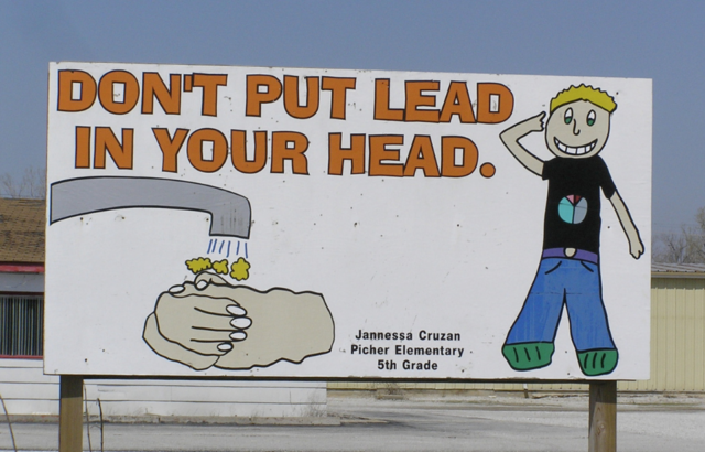 A road sign that reads "DON'T PUT LEAD IN YOUR HEAD"