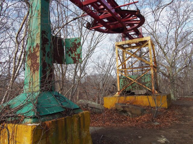 Rusting amusement park ride in the middle of Rocky Point Park