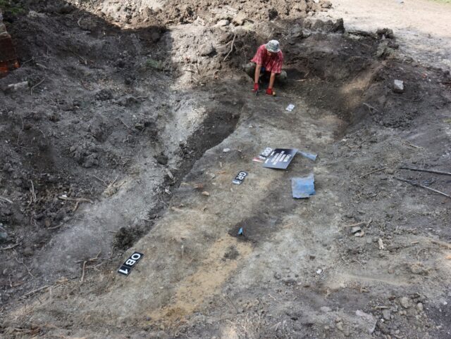 Archaeologist working at an excavation site