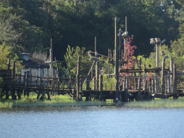 Wooden bridge running over a small body of water