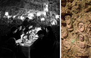 Crowd sitting at a table in the Chislehurst Caves + Carvings on a cave wall