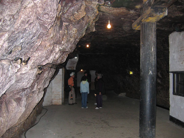 Group standing within the Chislehurst Caves