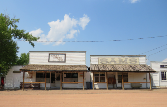 Two buildings along a dirt road in Rowley, Alberta